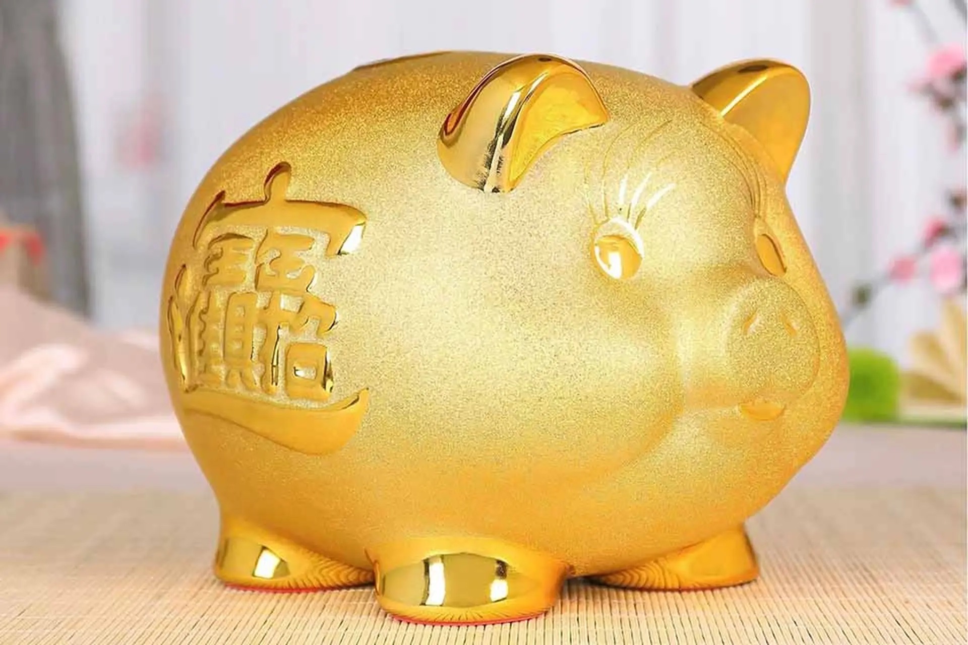 Ý nghĩa bỏ heo đất ngày vía Thần Tài